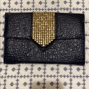 Super cute navy and gold clutch